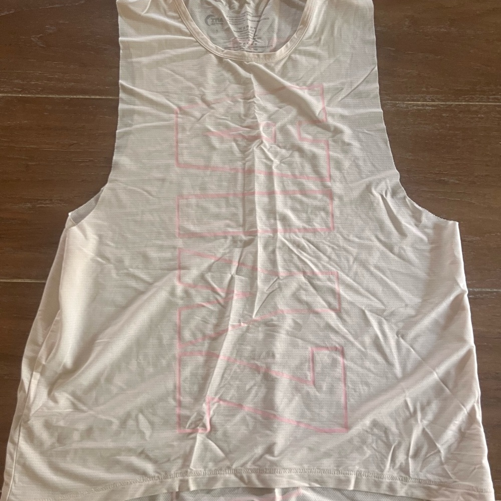 White Sleeveless Top with Pink Graphic